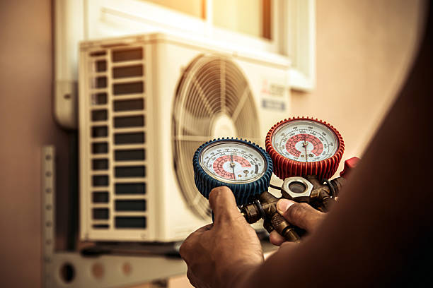 Professional Heat Pump Repair technician working in Oakfield, WI